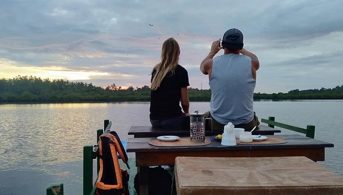 Watching the sunset over the water on a Mirissa lagoon safari